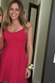 I was so happy with the material. This dress is lined and has a nice heavy weight so hangs nicely. I would have preferred a slightly tighter waist, but is stayed in place all night. The color was a deep pink, perfect for a spring party. - Sibby B.