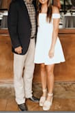 I wore this dress for my engagement party and it was great! Good length - not too short, not too long. The quality of the material is really nice, it's more thick and heavy rather than thin and flimsy. Not see through or sheer anywhere at all. - Danielle J.