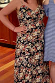 It's a really cute dress, but it has some serious design flaws. The front has a hook so you don't show too much cleavage, but when you sit the space between the stitching and the hook gapes open. It looks awful and like you've pinned it shut yourself. They could have just stitched it shut themselves. I'm not sure why they designed it like this. The slit in the front is a nice detail, but you have to be careful because it's super high. - Jennifer V.