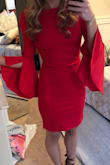 I wore this to my work Christmas party. It was cute, but the material in the middle would bunch up easily. I would have to keep checking my posture in pictures or it would look horrible. Thick material. I don't know if getting a bigger size would help. - Alexis B.