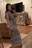 I was really surprised at being a size S in this dress. I normally order Medium or Large in most clothes, but I took a risk because only small was left. It fit perfectly! To be fair, I am smaller on top than on the bottom and the bottom is very flowy. Be warned: it's not a true wrap dress. It only looks that way. There is a zipper in the back so there's not much stretch in it. It will be perfect for my husband's homecoming from deployment! - Andrea C.