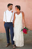 I tried on both a L and M and picked the M. I didn't have to alter anything about the dress, it fit like a glove and was absolutely perfect for my beach side wedding. It's stretchy, comfy, and made me feel great. I love everything about this dress!! - Chantrelle C.