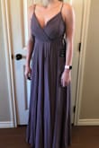 I bought this as a bridesmaids dress and was pleasantly surprised by the fit!! I thought the neck line would come down too far for my well endowed chest, but it's perfect!! Just enough coverage and still pretty! - Ashlynn P.