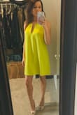 This dress is so pretty and classic. I ordered this for my son's preschool graduation because it is such a classic look. The perfect dress for any event especially if you don't want to wear something that is too form fitting but still stunning. A must add to any closet. I ordered both the yellow and blue but am drawn to the yellow. Color is amazing in person. - Cara R.