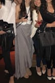 Love this skirt and the material is really nice and flowy without being too thin. As many of the other reviews said, definitely a big longer than it looks in the photo as it was touching the ground even in 3.5" heels. Overall, love it though! - Natalie S.