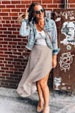 This fit perfectly! I'm 5'9 and the length fell just above my ankles but it didn't look too short because of the asymmetrical cut. I thought was the perfect length to how off a little leg but still be fun and flirty. It sits right where it should on my waist and moved really nice. Def recommend! - Nicole B.