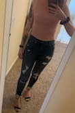 I normally wear a small in most shirts, but I got a large because the reviews said this is short. I probably could've gotten away with a medium but the longer length in the large makes me feel less self conscious. I am definitely keeping it. It goes right to my belly button. If you want it to be a true crop top, get your normal size. If you want it to be a little longer then size up a size or two. The ribbed material allows it to still hug your curves! - Caitlin B.