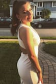 It was a little low cut. An overall beautiful outfit! Perfect to size and fit perfectly and how I wanted it to. - Angel F.