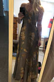 I bought this dress for a wedding I'm going to in a couple of weeks. I didn't realize from the pictures on the website that the bottom is see through, but it actually added a little flare to the dress so I loved it. The string that goes around the waist really accentuates the waist while still feeling comfortable. I love it! - Tatiana M.