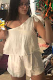 Love this romper it is so flattering but I'm having to get it taken in because it's just too loose in the chest area even though I have big boobs. Might consider ordering a size down next time. - Paris K.