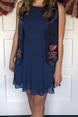 Super cute and simple dress. Loved the open back and high neck line! - Sabrina C.