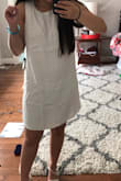 The dress is a simple comfortable dress that I can enjoy wearing to the beach or when Im just out for the day. I originally bought this for my graduation and it was perfect. This dress can be dressed up with some wedges and jewelry. I love it!! (excuse the wrinkles, my fault) - Grace C.