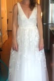 This was a pretty dress but it was too big and it just wasn't my style. If I were to wear it, I should have gotten an XS (the waist and top were too big and it made the dress look baggy). In general though I wasn't especially keen on it because the embroidery and white tulle looked a bit too shiny. I usually LOVE dresses from Lulus, but this was just a so-so. No problem, though...I wound up buying another dress from Lulus as my wedding dress! - Sarah R.