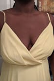 The dress is a beautiful color and perfect length. I usually have to order larges because I have a larger bust and hip area but the bust area is so awkwardly designed in this dress. It is extremely loose and hangs off you. This dress does not sit on you like it does the model. Had to return! - Kenya M.