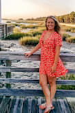 I wore this dress on vacation and absolutely loved it! So fun and flirty! Just had to use some fashion tape to keep it in place, but other than that it was perfect! - Jamie M.