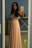I love the materials and how it's fits perfectly. Of course being under 5' I had to get it hem. It's a beautiful 3 layered dress. - Sue V.