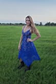I wore this gorgeous dress to a country wedding! Such a gorgeous dress! I purchased a medium and it fit me like a glove. I wore it with cowboy boots and it looked amazing! This dress can be dressed up or dressed down. I am so glad I purchased this dress! I would highly recommend it. It is extremely classy and it hugs your figure at the right places. - Lisa G.