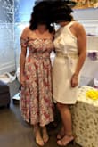 I wanted an XS, but it was out of stock. I ordered a small. So glad I did! I could wear with or without a bra. Got lots of compliments. Does come down lower on me than the model. It's about mid calf! - Rachael A.
