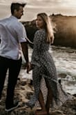 This dress was PERFECT for my engagement pictures. So flowy and sexy. The fit was pretty perfect, but if you want it tighter on your chest I would size down. When I put it on I kind of laughed cause it looked like a sack. Once I tied the belt and found my waist again (lol) I fell in love. Warning - if you wear this in a windy area prepare for it to fly up and cause a flash of your booty. The side slits are awesome but not friendly to the wind. :) - Lauren D.