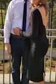 I wore this dress to a wedding rehearsal dinner, and I got so many compliments! I usually wear a small, but the medium fit perfectly! Sexy but classy! There is a zipper on the side. - Ashley S.