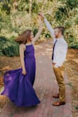 ABSOLUTELY LOVE THIS DRESS! Other than having to get it hemmed because it was too long, the fit was perfect. The dark purple color is so gorgeous and the back is stunning! Be aware that you will definitely need someone to help lace it up because it's not easy haha. I wore it for an anniversary photoshoot with my boyfriend and it was just perfect. - Thalia D.