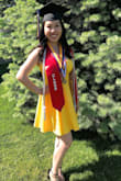 Wore this dress to my high school graduation! I received so many compliments. The color is a beautiful bright yellow and is so flattering! It runs true to size and fit me like a glove! - Gloria C.