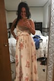 This is a Beautiful dress but where the chaps is on the chest is too small and opens whenever you take a breath. I bought this for a wedding and just wore a lace cami underneath it. I would've gotten a larger size but they didn't have any in stock. Wear heels cause it's very long. - Caroleena K.