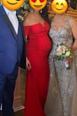 I wore this to a formal wedding while 25 weeks pregnant. I'm usually between a small and medium in regular clothes so I got a medium and large to try. The medium fit perfect (just had to be shortened). The material has a lot of stretch so it worked well with my bump. I was very comfortable all night. The dress was amazing quality. - Melissa P.