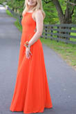 The dress was so pretty and fit very well. True to size. The color was a deep orange and just beautiful. - Chris F.