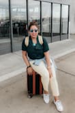 This quickly became a favorite during my travels. This simple buttoned up house was just what I needed to complete my look-casual, comfortable, chic. Great fit! Make the look pop with a fun color trousers! - Stephanie S.