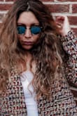 This snazzy jacket was put together in the best way. With its intricate colors and material, it brings your outfit so much life. Throw this on with a tank top underneath, a pair of fitted jeans or dress it up for work with a sleek, pencil skirt. - Stephanie S.