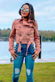 What i love about this coat is the style and color, it is a cropped trench but so cute and stylish, i have been wearing this jacket since i bought it, it absolutely goes with everything and the color gives it just enough classic look. The material is suede and soft but my one complaint is that it has no linings, so inside looks rather rough other than that this is my favorite crop jacket and will be wearing it with everything ! - Donia M.