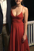 Got a ton of compliments on the dress! It shows a little more cleavage than I normally go for but the longer length helps balance that a bit. Beautiful color and wonderful fit! The back of the dress is really pretty and great for an outdoor event. - Clare G.