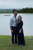 This dress is honestly the most comfortable thing I have ever worn to a wedding. The wrap style lets you show as little or as much as you'd like in the chest area. Super comfortable material, not too thick or heavy. I wore it to a wedding in NH outside when it was in the 70's, wasn't too hot or felt like the sleeves were too much. I think you could get away wearing this is any season! Length was a tad long but perfect for me when I put wedges on, the slit wasn't too revealing either. I received so many compliments on the dress both during the wedding and then online when pictures were posted on social media. I would highly recommend. - Courtney C.