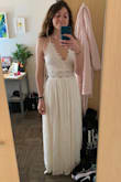 I loved the flowy feel of this dress. Made me feel like a beach goddess! I was back and forth between this dress and another Lulus dress from my bridal shower, and I ended up choosing the other one just because this dress was a little more "revealing" with the deeper V and the cut outs. I felt so beautiful in it though. Only thing I would warn against is the triangle shaped pieces of fabric lining the chest area don't really lay very well...I thought maybe I could use an iron to make them lay flat but didn't want to risk it since I considered returning the dress. Super flowy and comfortable though! - Sarah S.