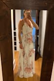 This dress is stunning. Fits great and looks beautiful on. It's a little long, but with heels it will be perfect for me. Not see through at all. The fabric is comfortable. Overall thrilled! Sorry this isn't the best pic but I haven't been to the event yet to get a really good pic of it. This one doesn't do it justice. - Erin B.