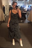 Flattering and chic, yet it has a slight sex appeal. The ruching hides any tummy you may have. Love it. - Caitlin B.