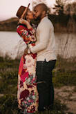 I ordered this dress for a fall engagement shoot and it was perfect. The colors are beautiful in person. The length is great... I wore it with sneakers for the shoot but could have easily worn heels! The tie waist allows for adjustment which really benefits someone with a smaller waist. Also, I didn't feel like I needed more clevage to fill it out at the top, however an additional clasp for closure at the bust would have been a plus. Overall, I am very pleased with this dress. - Destinee H.