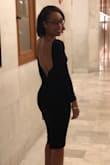 One of my favorite dresses of all time!! Ordered for a friend's elopement and could not have been more pleased. The material is thick and forgiving. It hugged in all the right places and the piping along the back helps to hold the open back on place. - Destinee H.