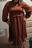 It's a forgiving dress :). It's comfy and fun. Fits well! - Caitlin B.