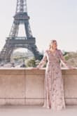 I bought this dress for a photo shoot my husband and I did in Paris for our anniversary. I absolutely love this dress. It's a little long, but I wore higher heels so it wasn't awful. I have a larger bust so the front was a little more open than I would prefer but perfect for the shoot. - Megan C.