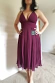 This dress is fantastic. Needed it for a wedding and based on reviews and my measurements, I went with a small instead of my usual medium. I am curvy, but with a small rib-cage and the bottom half of this dress easily allows for my ample booty. Since you can't wear a regular bra with this dress, I hoped the empire waist would zip tight similar to a bra-band, and that maybe the straps would tighten enough to maintain the ladies. Check. However, I will absolutely have to use fashion tape to keep them in just to be safe. - Carolyn L.