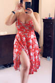 I bought this dress in a large in the red. I have a small waist but large chest so I was worried this dress might not fit. It does fit perfectly even with wearing a bra. The material is soft. You can dress this up or down. Will probably buy another color. - Amber L.