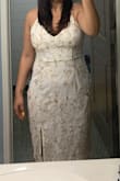 The large fit but I couldn't walk with my hips and but area. Totally recommend it's gorgeous - Gizela T.