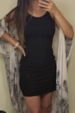 It's a cute casual dress. The fit is kind of awkward though. It gaps it the lower back area but I dont think I could be comfortable in a size down. It's definitely form fitting, but does not necessarily "hug". - Erica S.