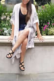 Its super flowy and light. Love to wear over a bodysuit and shorts or a cute little dress. Would definitely reccomend. - Erica S.