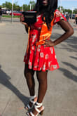 I fell in love with this dress! SUPER pretty and the color is very vibrant. Since my breasts were fairly big, and I ordered a Large, the button that came with it kept popping off. But if you have smaller breasts, please order! It's on the short side but totally worth it!!!! - Esther M.
