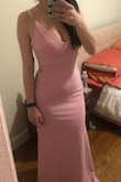 The fit is amazing. It is very flattening. The pink however is more like a peach color, as you can see in this picture. But it is a very beautiful dress. I will have to shorten a bit though. - Natasha M.