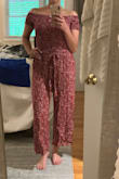 I needed a go to jumpsuit for the summer that was comfortable and that I could dress up or down and this was just what I was looking for! The material is light and comfortable. Off the shoulder is sometimes unflattering on me and this hits the shoulder just perfectly and doesn't squeeze my arms. Love and can't wait to wear! - Christina P.