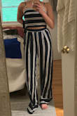 I absolutely love this two piece. It's so classy, and fits perfectly. I think where it hits on your stomach depends on your specific body type but I love that it only shows a little bit of skin so it's more versatile (i.e. can wear it out to dinner with the in-laws and not feel naked). The only caveat is that the top you have to tie together in the back and the material makes me a teeny bit concerned it won't hold together (I tried to tie myself so I'm hopeful when I have someone else tie this tighter it's not an issue). Overall love and am excited to wear! - Christina P.